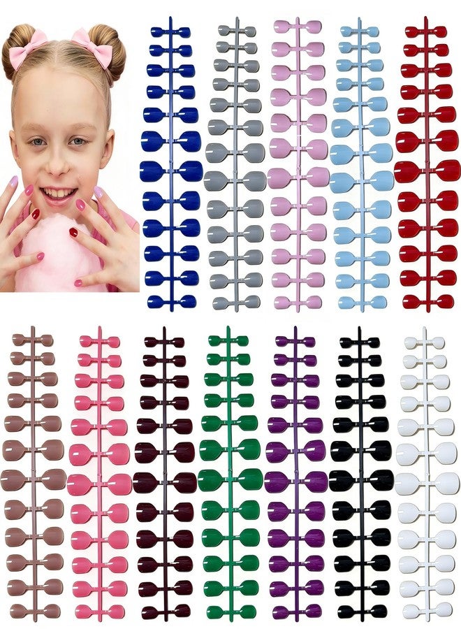 Wsimily 288 Piece Kids Short Press on Nails, Wsimily 12 Colors Little Girls Almond False Nails Acrylic Full Cover Fake Nails with Nail Adhesive Tabs, Children Women Girls Artificial Fingernails Decor - Image 1